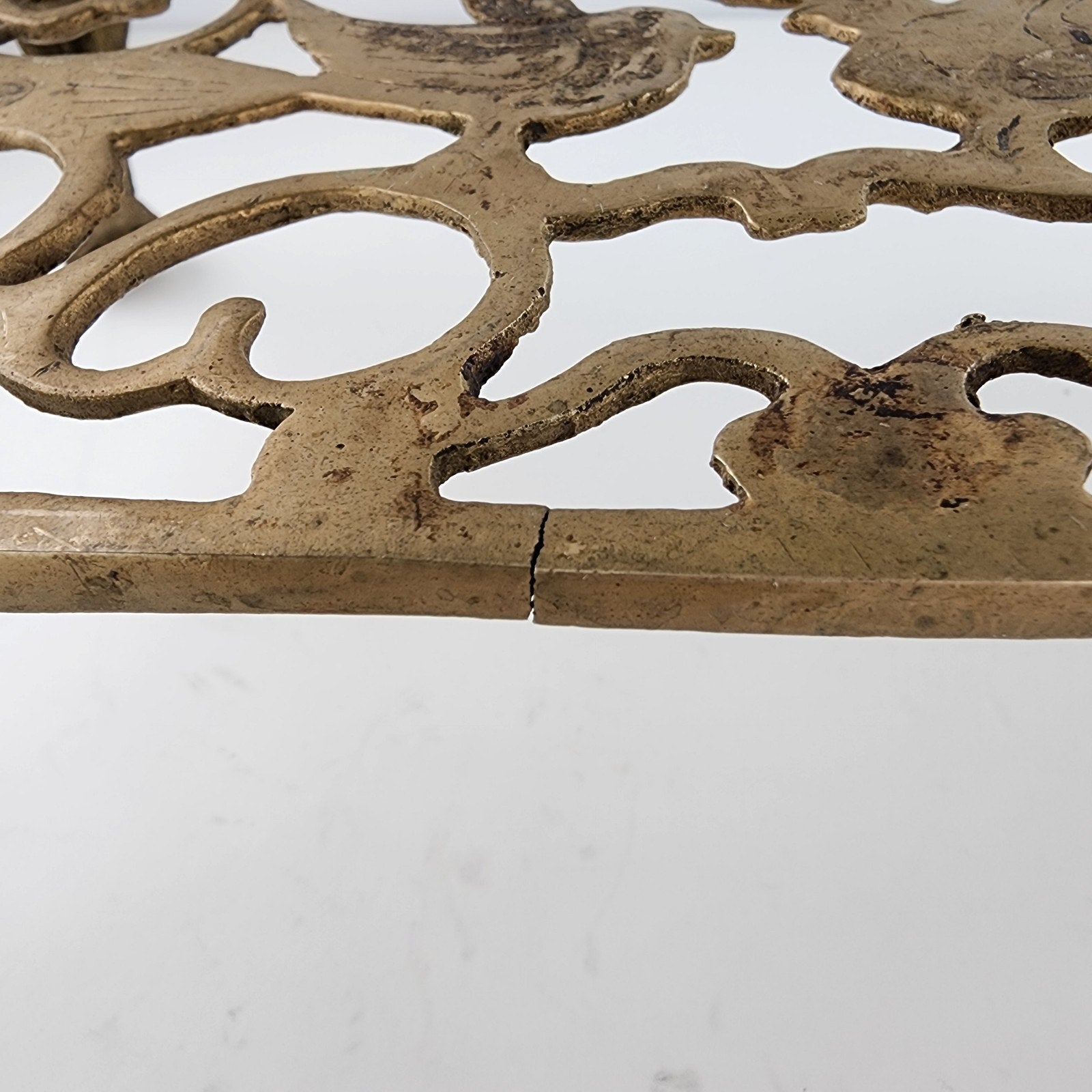 Antique Footed Brass Trivet Kettle Rest with Bird Decoration